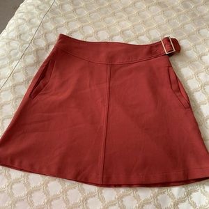 Rust mini skater skirt